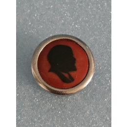 Знак с изображением Ленина в профиль.