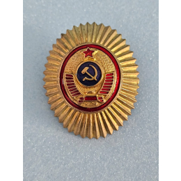 Милицейская кокарда.
